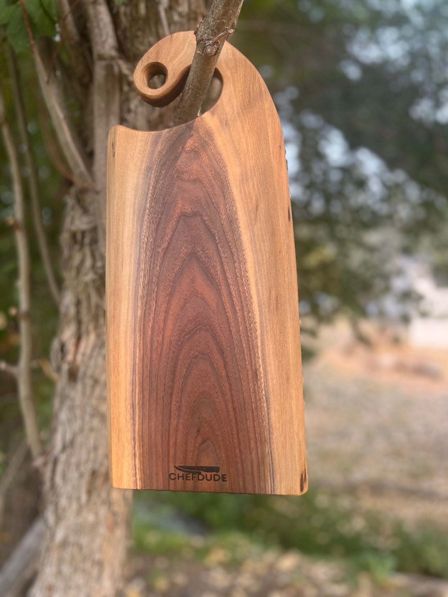 Rustic Walnut Cutting Board with Curved Handle – Handcrafted with Natural Sapwood (7” x 17” x .8”) - Chefdude Boards