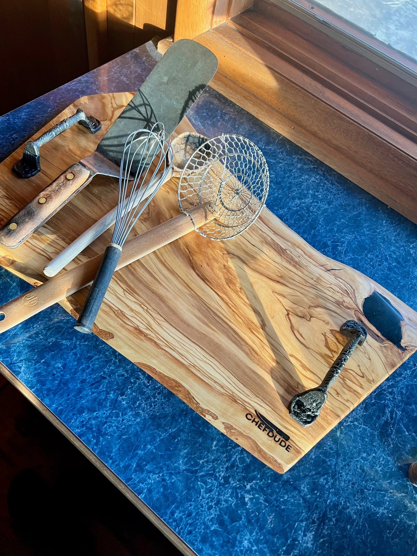 Stunning Live - Edge Olive Wood Charcuterie Board - Cast Iron Handles - Chefdude Boards