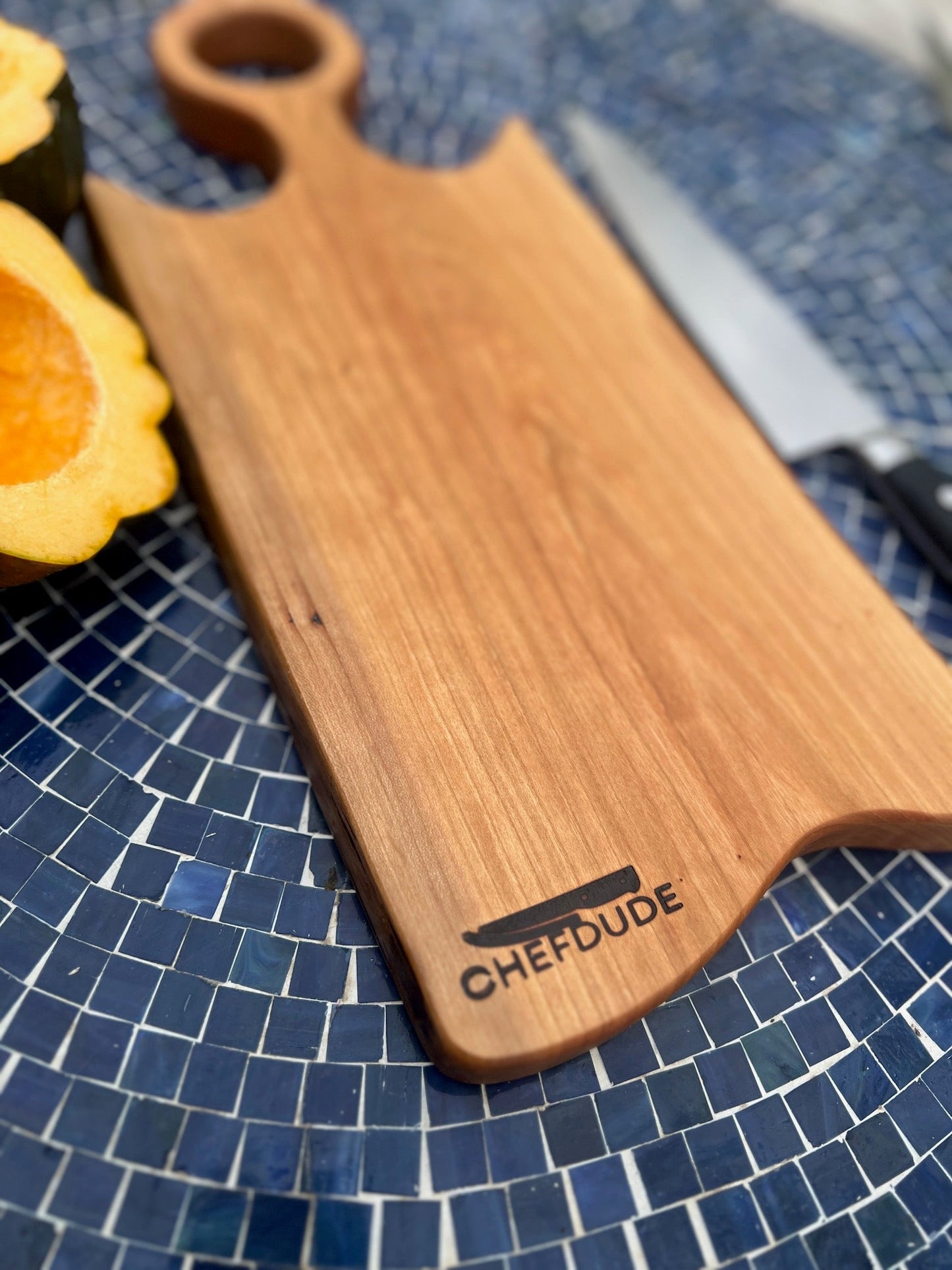 Rustic Cherry Wood Cutting Board with Ring Handle – Handcrafted & Stylish - Chefdude Boards