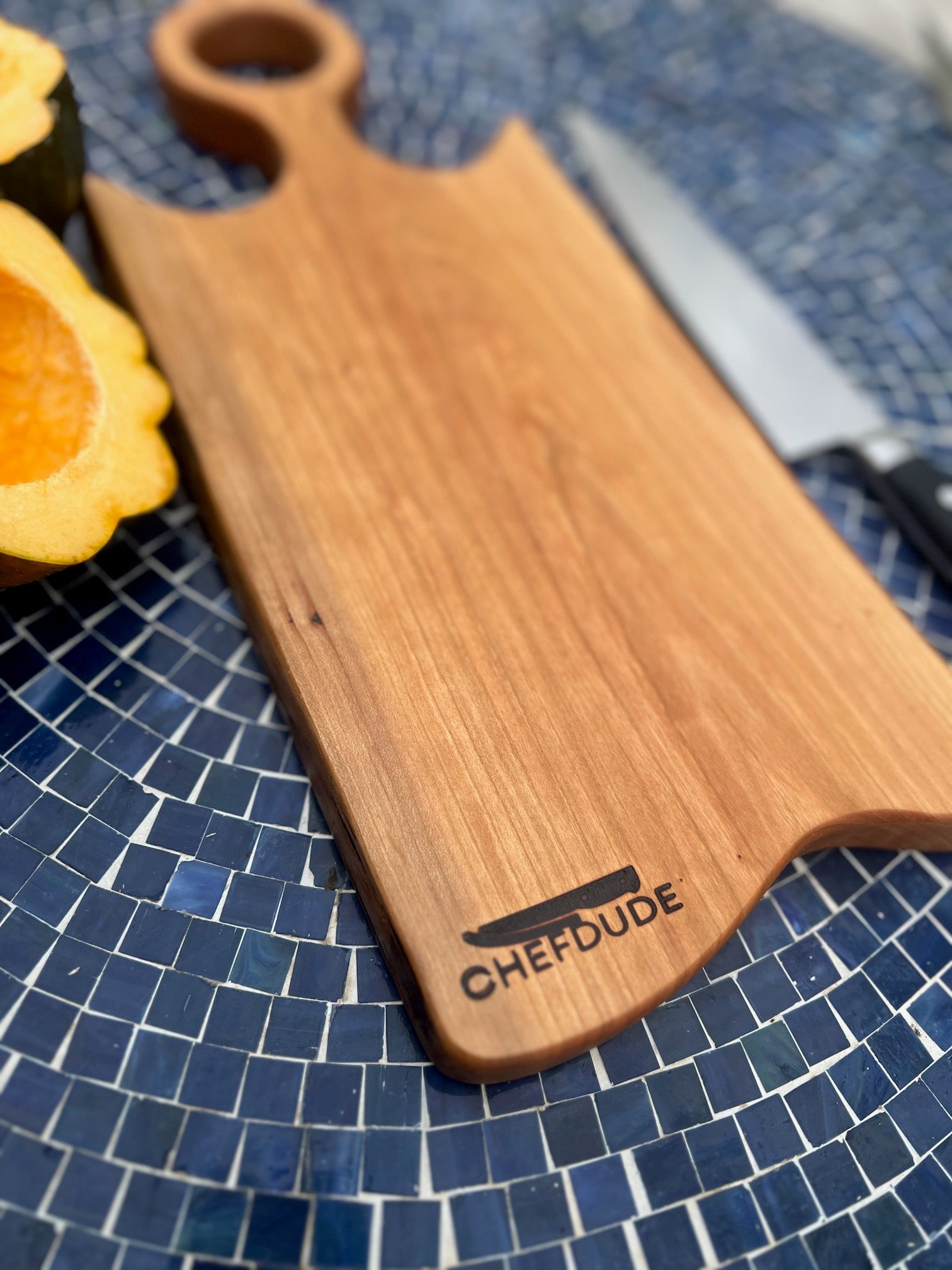 Rustic Cherry Wood Cutting Board with Ring Handle – Handcrafted & Stylish - Chefdude Boards